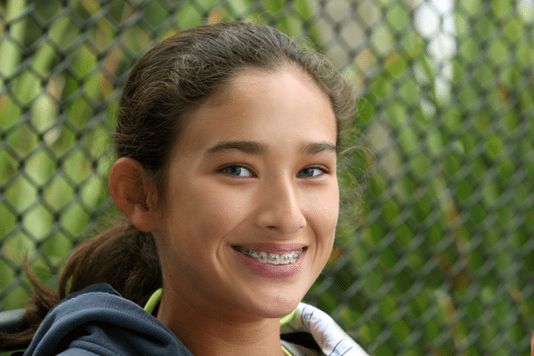 teen girl wearing braces in Roseville, CA