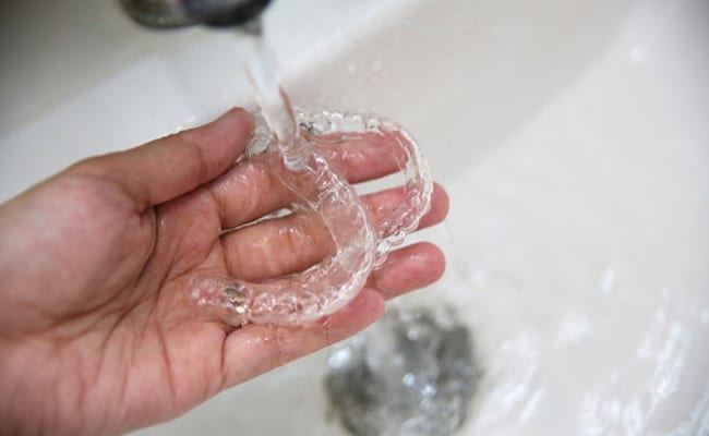 rinsing out Invisalign clear aligners