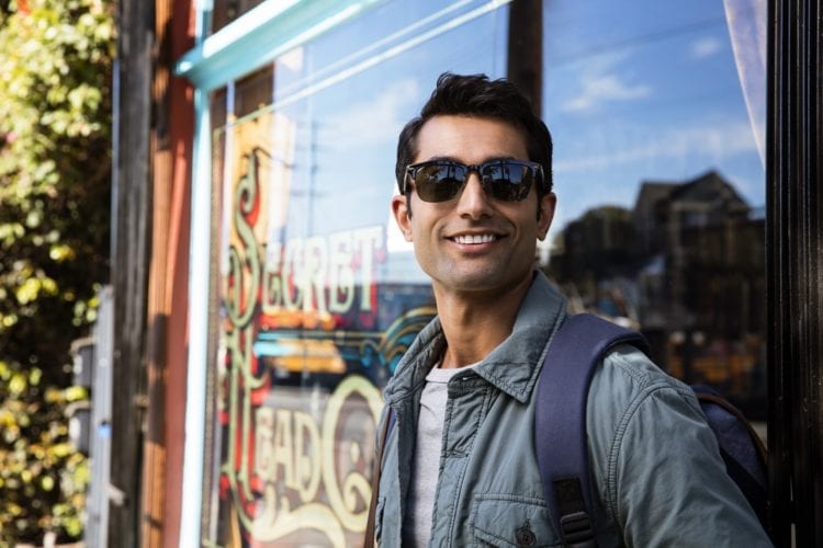 Man wearing sunglasses outside Invisalign
