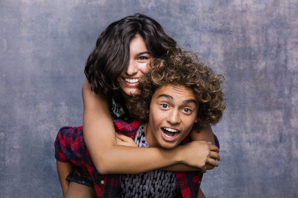 photobooth with teen couple wearing Invisalign Teen