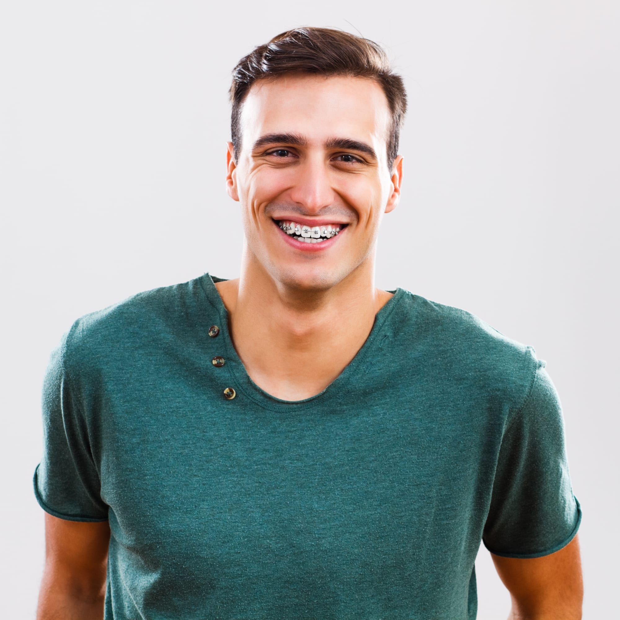 adult-man-with-braces-2000×2000 close up of adult man wearing braces