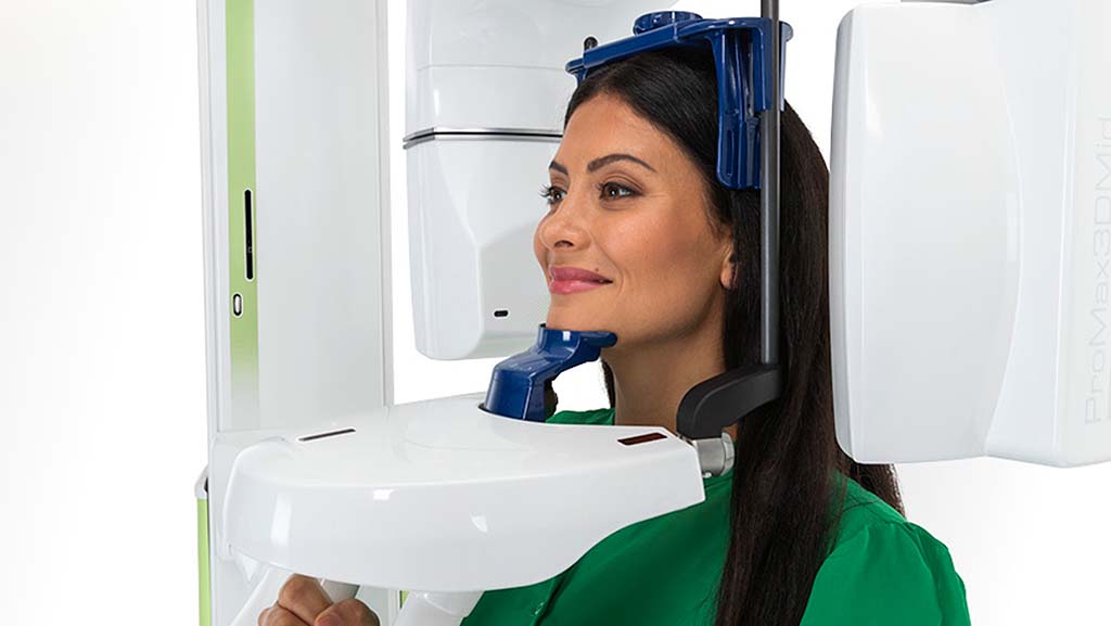 Planmeca ProMax 3D Mid cbct unit Women getting a 3D xray using the Planmeca ProMax at American River Orthodontics