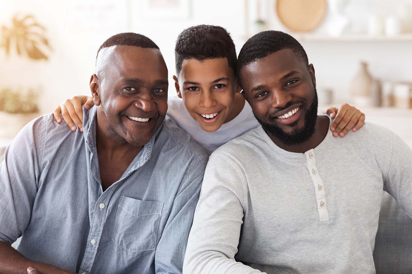 3 generations of a family all with stunning smiles after visiting the family orthodontist for Arden Arcade, Sacramento