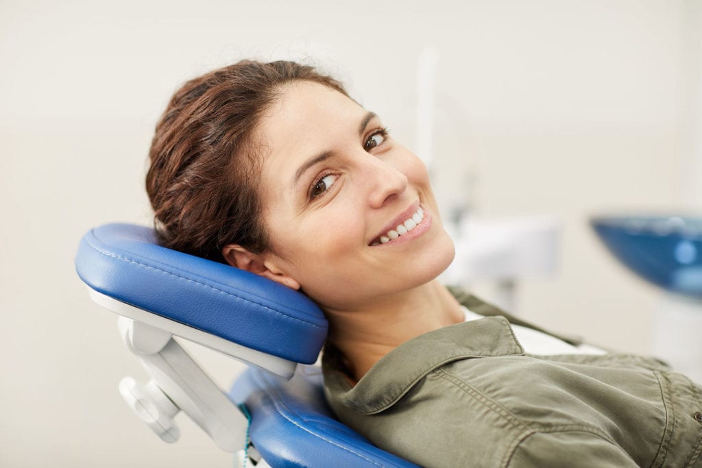 New patient getting a free consult about getting braces with an expert Sacramento orthodontist