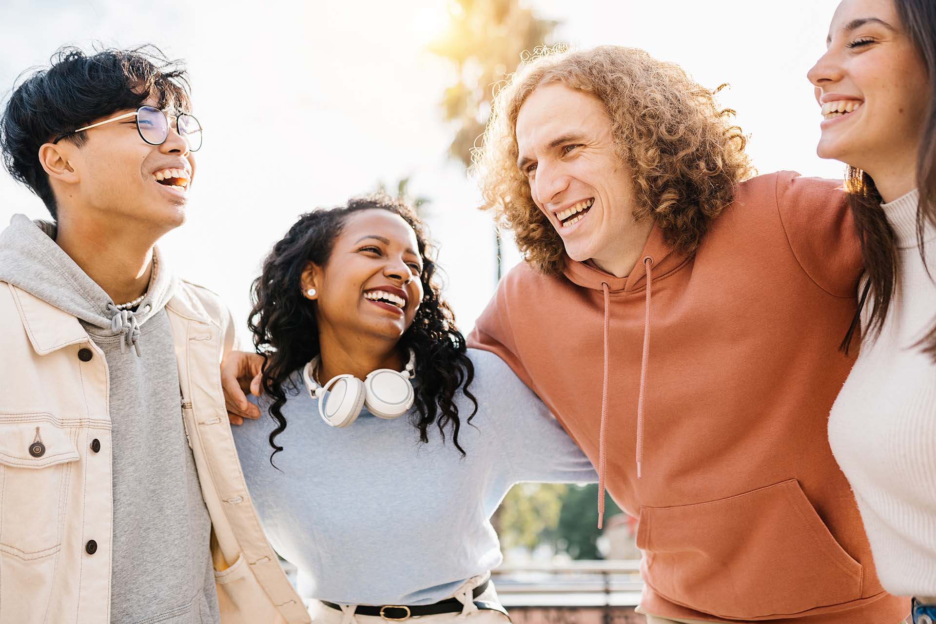 Young adult friends laughing together