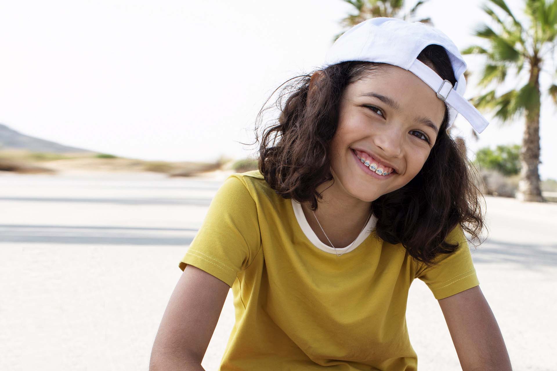 Young girl at the beach with LightForce braces